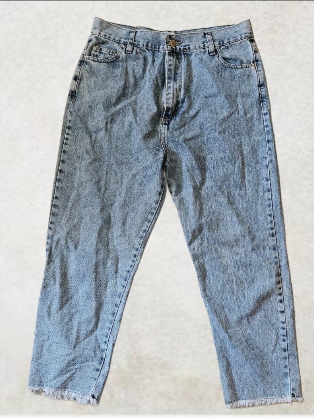 Chipre light wash blue denim jeans with a straight-leg cut and a raw hem